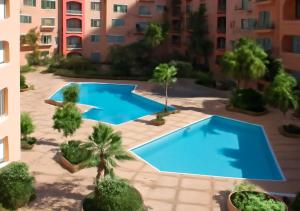 Swimmingpoolen hos eller tæt på Marrakech Appart + 20 billeder