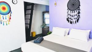Ένα ή περισσότερα κρεβάτια σε δωμάτιο στο Hotel Location Mirissa