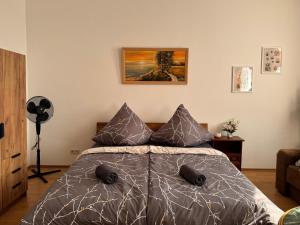 Ένα ή περισσότερα κρεβάτια σε δωμάτιο στο Blunest Apartment 3