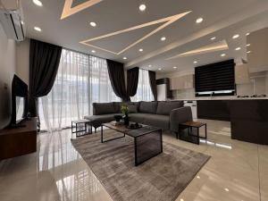 Posezení v ubytování Gerçek Residence Girne