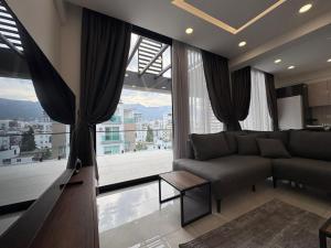 Posezení v ubytování Gerçek Residence Girne