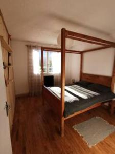 a bedroom with a bunk bed in a room at Mountain View 3 Bedroom Apartment Saint Beat Lez in Saint-Béat