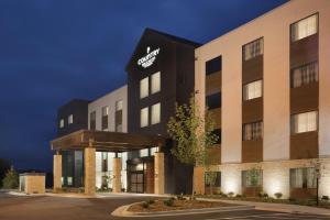 a rendering of the exterior of a hotel at Country Inn & Suites by Radisson Asheville River Arts District in Asheville