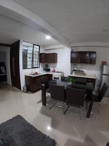 Kuchyň nebo kuchyňský kout v ubytování Departamento Diamante