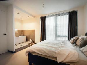 En eller flere senge i et værelse på Costa de Valencia Comfort