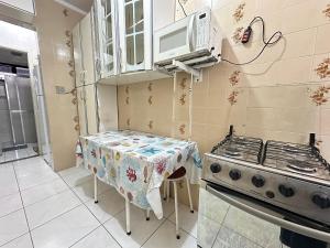 Kuchyň nebo kuchyňský kout v ubytování 1 Dorm Pé na Areia – Praia Guilhermina