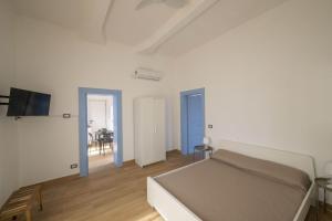 Una cama o camas en una habitación de Via Fortino Home