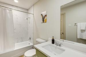 a white bathroom with a sink and a toilet at Group-Friendly Getaway with Fenced Yard in Temple! in Temple +21 photos