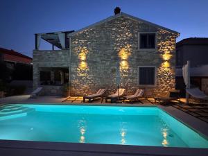 Swimmingpoolen hos eller tæt på Vi la Mare - Mediterranes Apartment-Feeling mit Poolgenuss