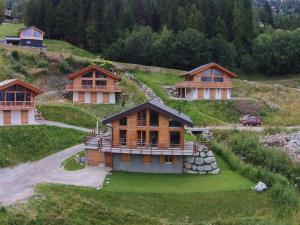 a group of houses on top of a hill at Chalet in La Tzoumaz near Ski Slopes in Riddes