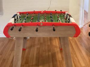 a ping pong table with a green top with balls at 4 star holiday home in Vinderup in Vinderup