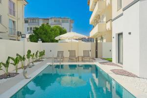 a swimming pool in the middle of a building at The B HOUSE in Fethiye