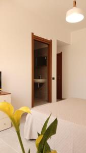 Postel nebo postele na pokoji v ubytování Un Letto a Casteddu