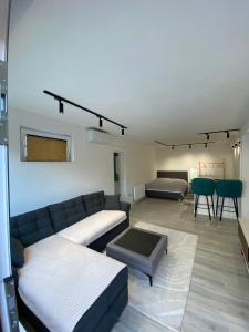 Et opholdsområde på GRBAVICA COZY APARTMENT - free parking