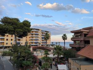 a view of the beach from a building at San Lorenzo Exclusive in San Lorenzo al Mare