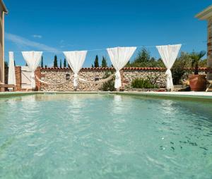 Swimmingpoolen hos eller tæt på Vi la Mare - Mediterranes Apartment-Feeling mit Poolgenuss