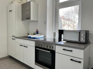 Nhà bếp/bếp nhỏ tại Spacious Vienna 4BR shared Stay for Friends & Families