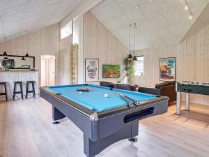 a billiard room with a pool table in it at 5 star holiday home in Grenaa in Grenå