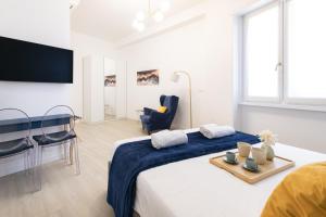 Ένα ή περισσότερα κρεβάτια σε δωμάτιο στο Easylife - Milano - Aurispa 2 - Navigli