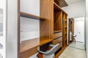 a home office with a desk and a chair at Rooftop & Private Pool Property Family in Guadalajara +44 photos