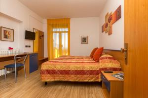 Gulta vai gultas numurā naktsmītnē Hotel Antica Croce - Gardaslowemotion