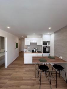 Køkken eller tekøkken på La Perla Holiday Apartment Golf del Sur