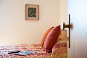 Gulta vai gultas numurā naktsmītnē Hotel Antica Croce - Gardaslowemotion