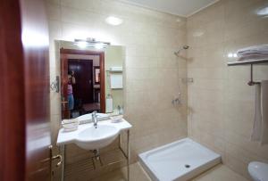 Koupelna v ubytování Orchidea Hotel