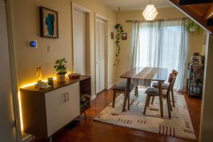 a kitchen with a table and a dining room at Dog Friendly Oasis Private Hot Tub with Sauna in Boulder
