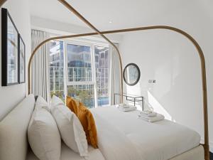 Postel nebo postele na pokoji v ubytování Stylish 1-Bedroom Escape - The PAD - Business Bay