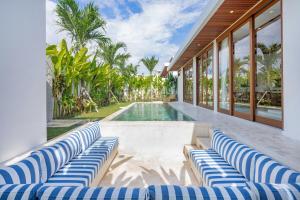 Swimmingpoolen hos eller tæt på Tropical 2BR Design Villa Pool, Lounge & Workdesk