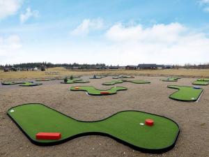 a group of miniature golf courses in a field at Luxury Retreat Tranum Strand - By Traum Ferienwohnungen in Brovst