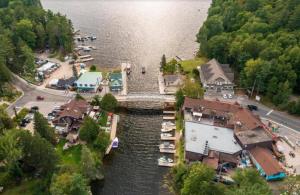 an aerial view of a marina with boats in the water at Algonquin Waterfront and Winter Paradise With Sunsets in Algonquin Highlands
