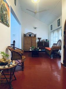 Χώρος καθιστικού στο Mogan's Guest House