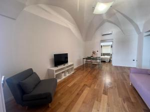 Una televisión o centro de entretenimiento en Casa Gio