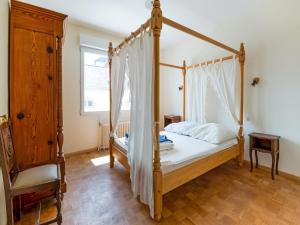 Ένα ή περισσότερα κρεβάτια σε δωμάτιο στο Beachside Family Villa in Le Pouldu