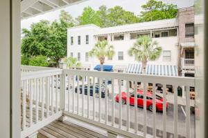 a view from the balcony of a house with a red car at Lowcountry Landing in Bluffton