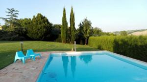 The swimming pool at or close to Il Gallo Del Vicino