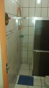 Ett badrum på Hospedaria - Hostel Gamboa