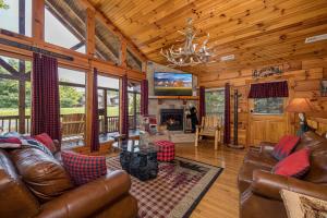 Televiisor ja/või meelelahutuskeskus majutusasutuses Bearadise Bungalow by American Patriot Getaways