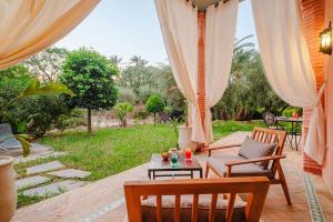 Aed väljaspool majutusasutust Palmeraie, Jardin et Piscine +50 fotot