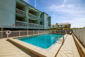 Swimmingpoolen hos eller tæt på Seaside Beach House 203