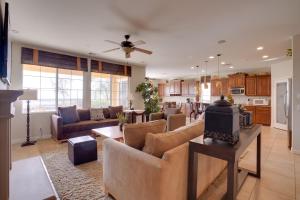a living room with couches and a kitchen at Single-Story San Bernardino Home with Valley Views! in San Bernardino
