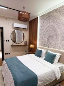 Giường trong phòng chung tại Luxury Apartment Near Makkah +7 ảnh