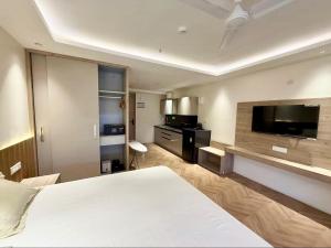 Ένα ή περισσότερα κρεβάτια σε δωμάτιο στο Cozy Stays
