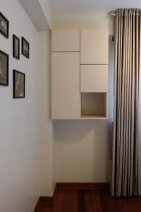 a cupboard in a room with a curtain at Ayra Hotel Boutique in Pisac +79 photos