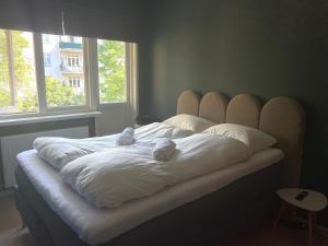 Ένα ή περισσότερα κρεβάτια σε δωμάτιο στο Modern Apartment