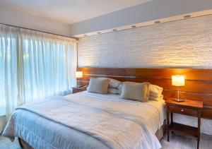 Giường trong phòng chung tại Costa Serena Aparts & Spa +43 ảnh