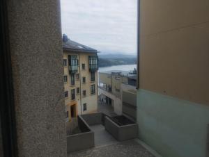 a view from a window of a building at Piso Ría de Ribadeo in Ribadeo