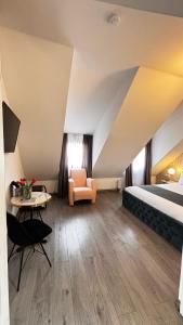 En eller flere senge i et værelse på VSA Boutique House